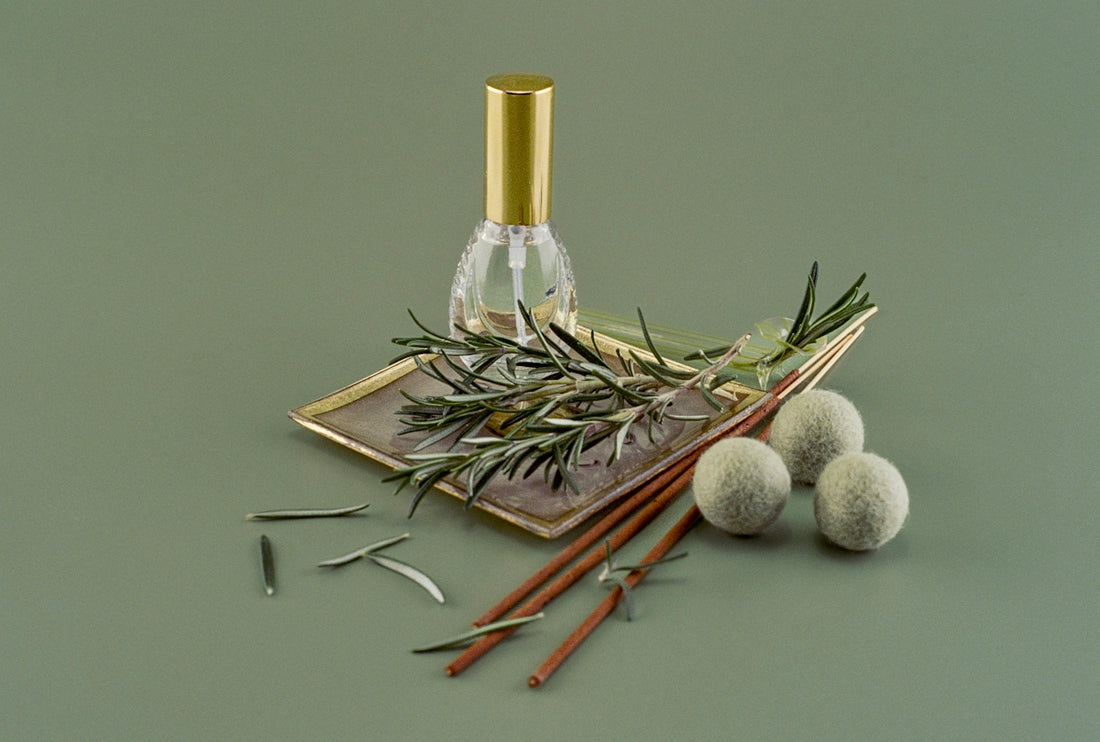 a bottle of perfume sitting on top of a table